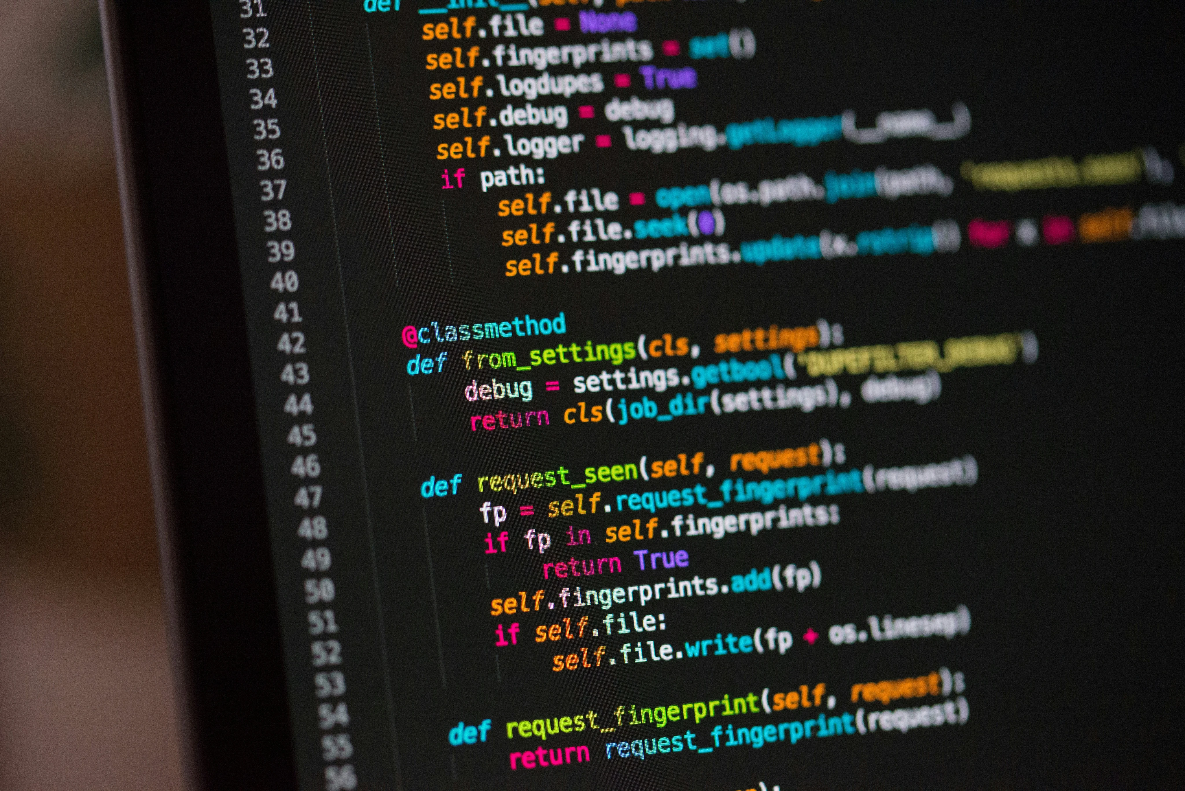 Python code sample on a dark screen